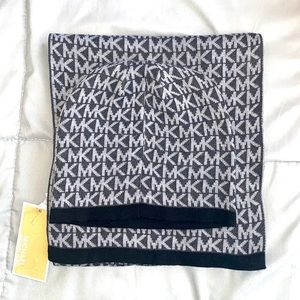 Brand new never used. Michael Kors scarf and hat set (tags still attached)